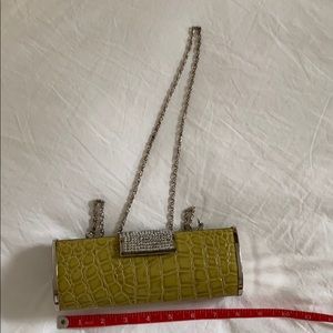 Chartreuse clutch with rhinestone closure